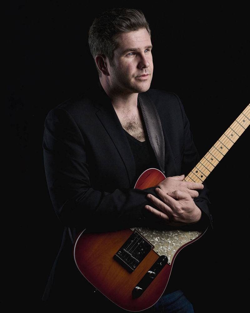 The recording artist and singer/songwriter Elison with a Fender Telecaster