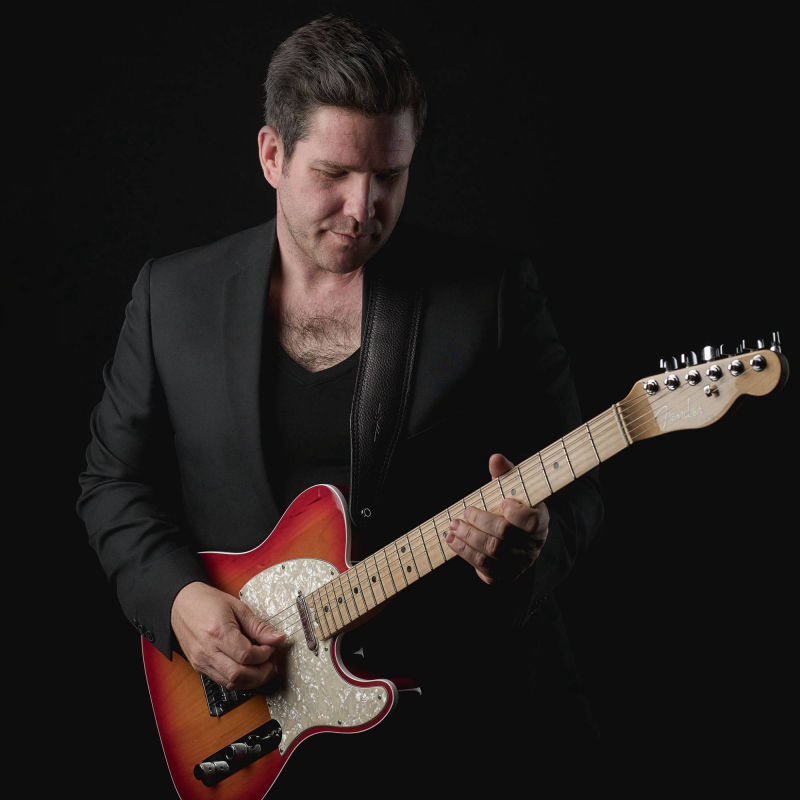 The recording artist and singer/songwriter Elison with a Fender Telecaster